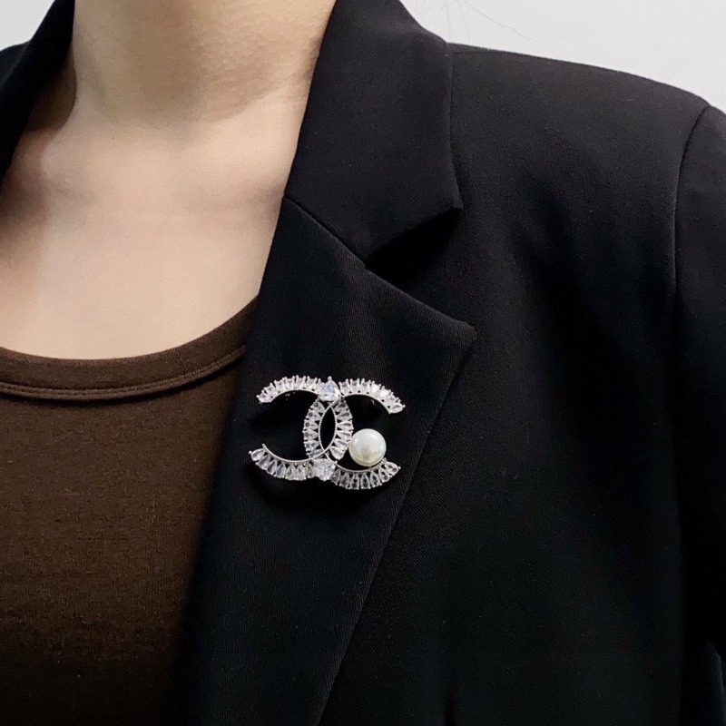 Ch**el brooches